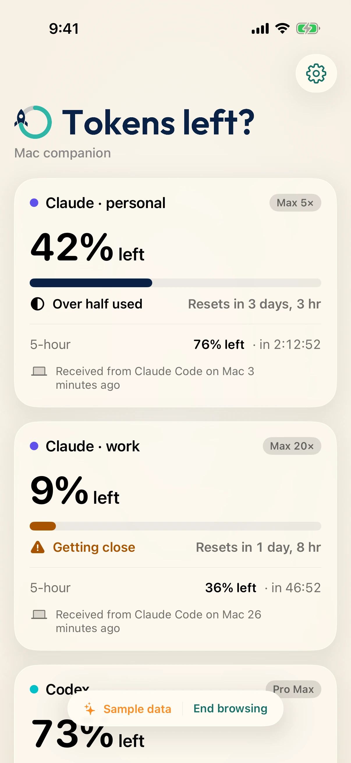Native iPhone companion in light mode with sample accounts and the Mac companion header.